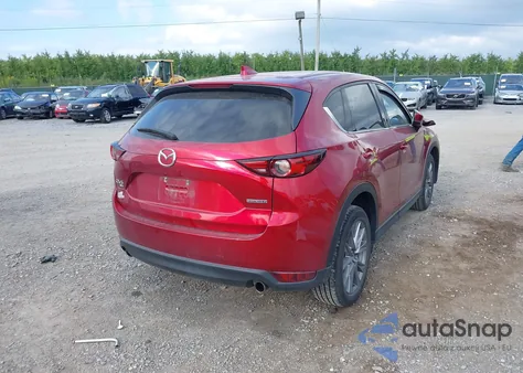 2021 Mazda Cx-5 Grand Touring z USA, uszkodzony, nr VIN JM3KFBDM7M0357057